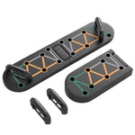 Foldable push up board featuring color-coded handles for targeting muscle groups and compact design for easy storage.