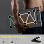 Foldable push up board being held, showcasing its compact and portable design for easy carrying.