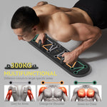 A man using a foldable push up board to build strength with color-coded handles for different muscle groups.